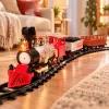 Set tren electric pentru copii cu locomotiva, doua vagoane de marfa, vagon de pasageri, sine si efecte realiste de joc