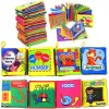 Set 8 carti senzoriale si fosnaitoare din material textil multicolor pentru bebelusi cu si fara agatatori cu tematici diverse, potrivite +6 luni, 4 pagini/8 fețe, 10x10x4 cm