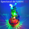 Jucarie Interactiva muzicala, cu lumini multicolore si rotire 360° , Omida Cantareata, 25x14 cm, 3+ ani