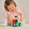 Jucarie interactiva pentru copii, model baietel pe tricicleta, cu efecte sonore, lumini intermitente si miscare automata